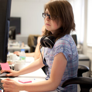 a woman working on a computer