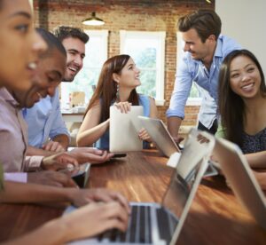 Group of people working with laptops