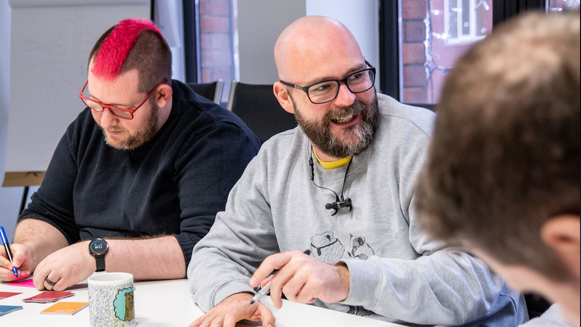 Group of people working at a table