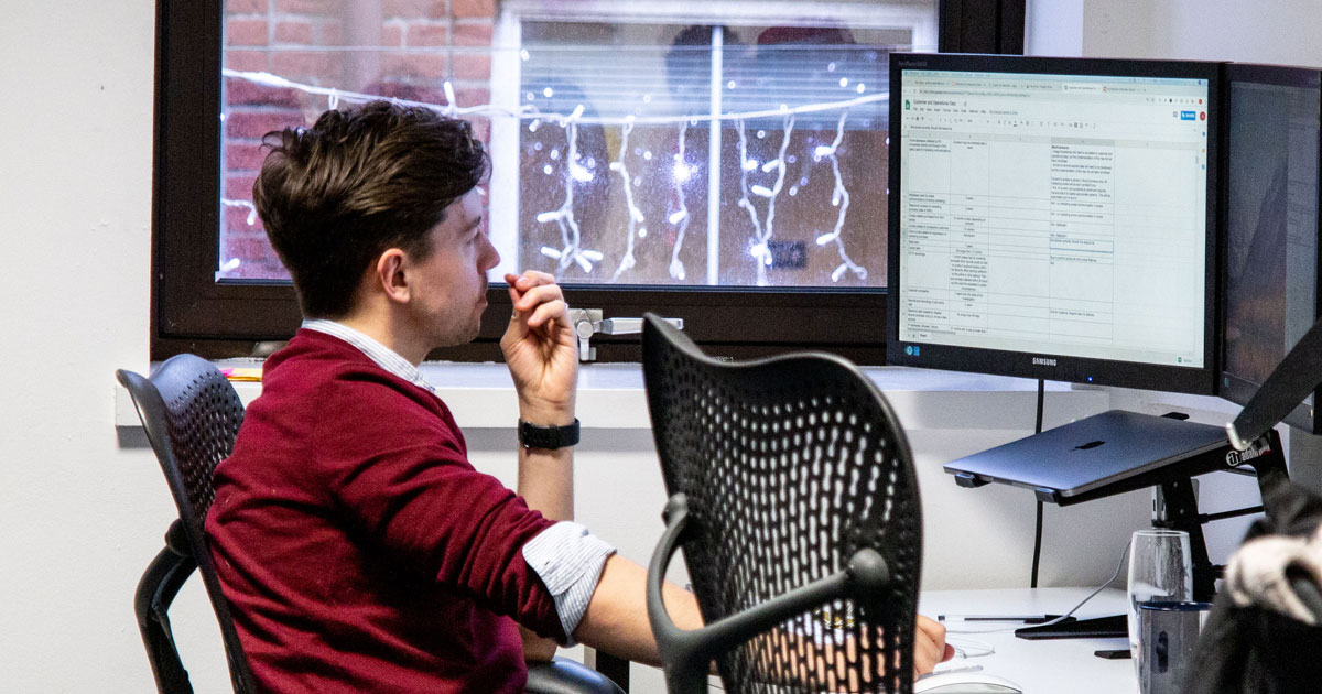 Developer looking at computer screen