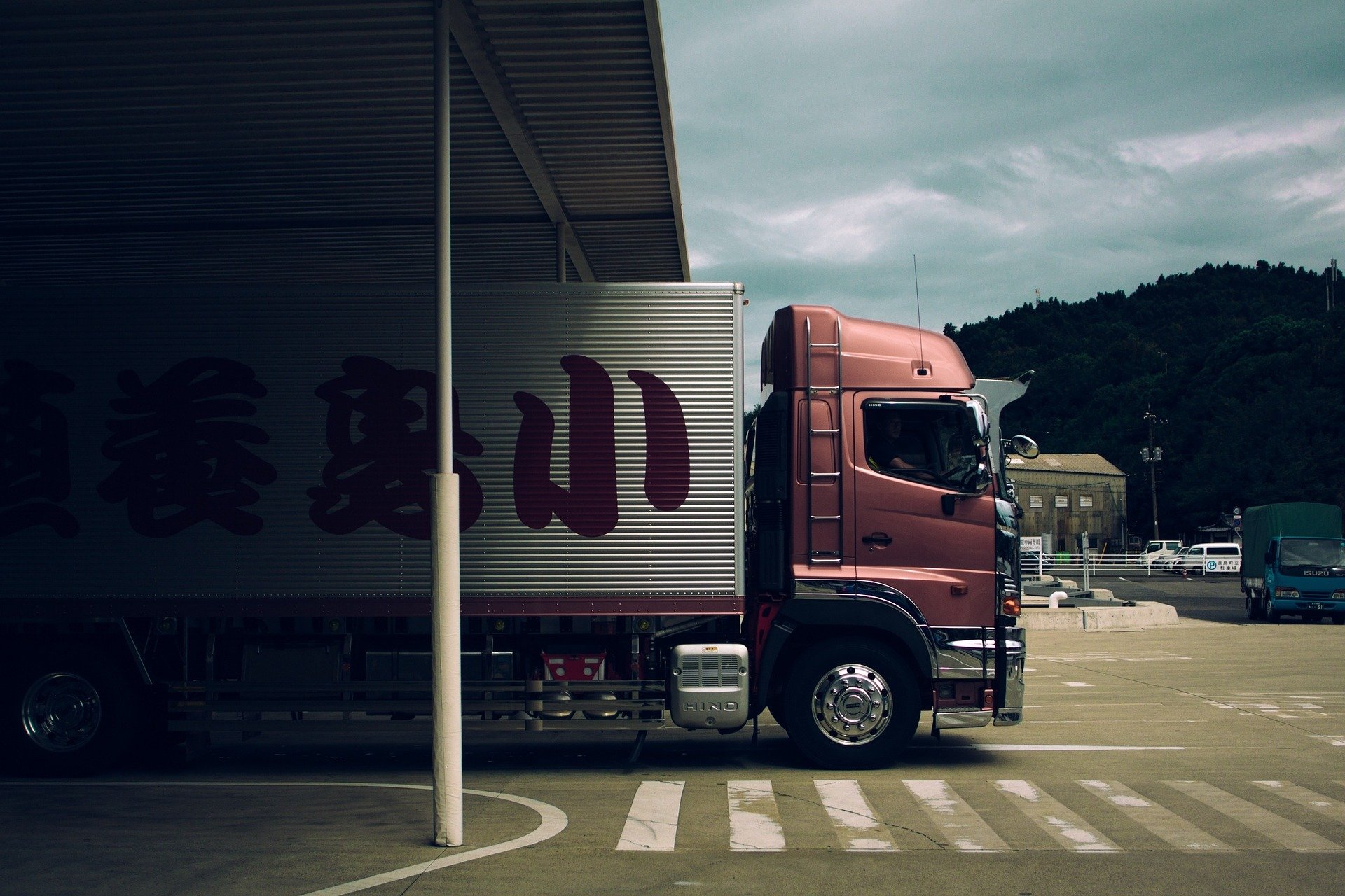 Truck coming out of warehouse