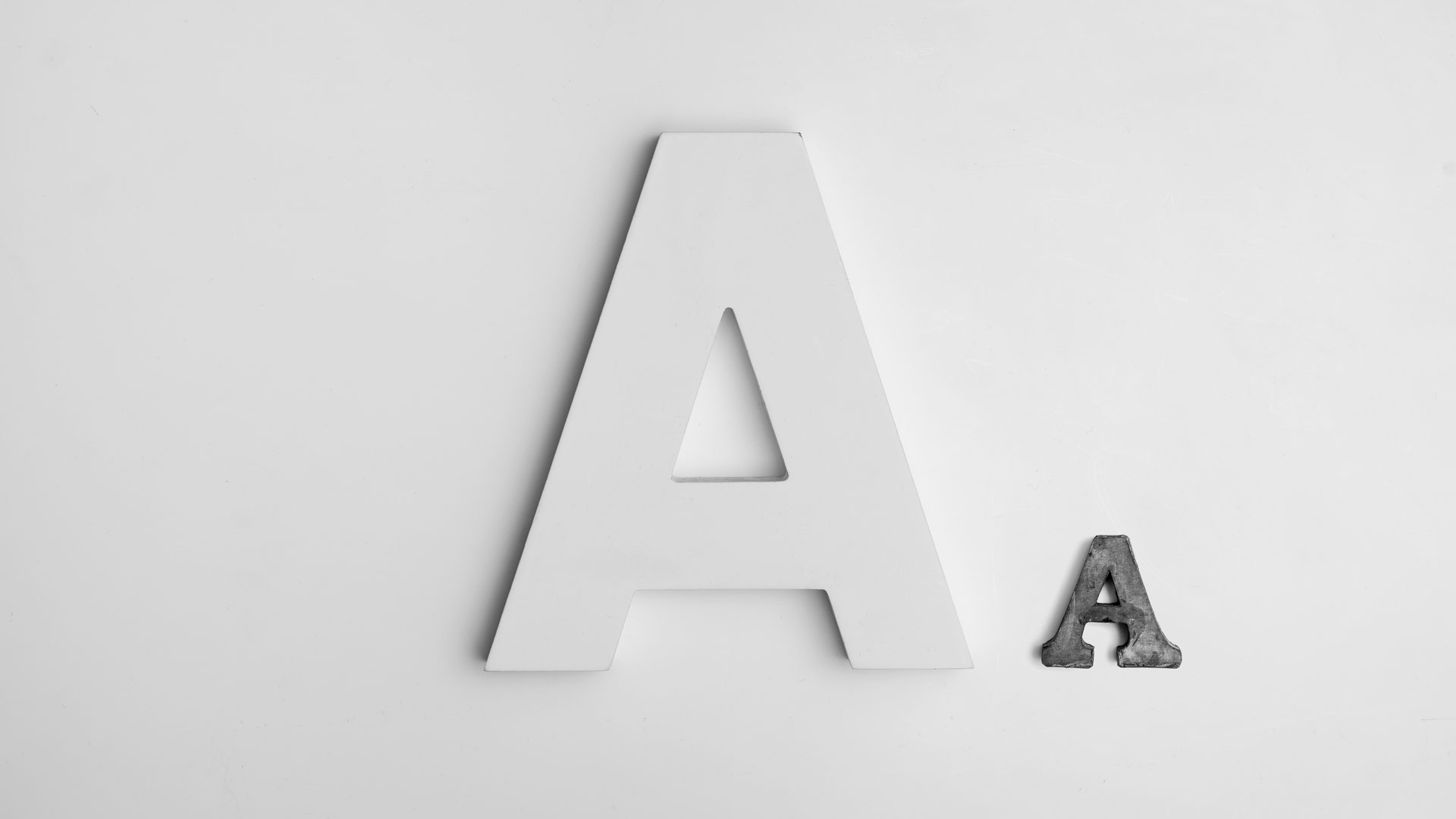 Large and small letter 'A' characters